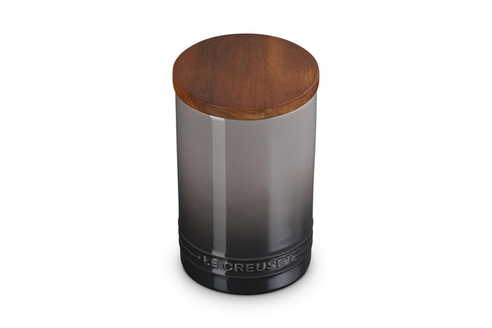 Oyster 26oz Le Creuset Stoneware Signature Canister with a wood lid on a white background
