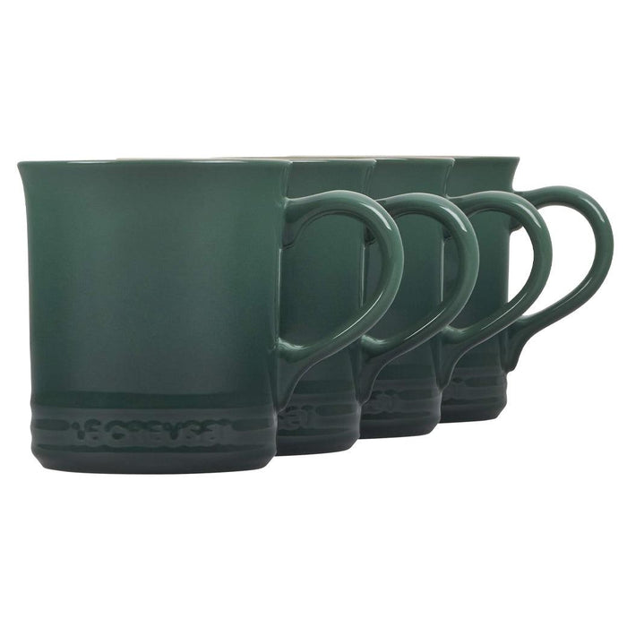 Artichaut Le Creuset Stoneware Set of 4 (14 oz.) Mugs displayed diagonally in a row on a white background