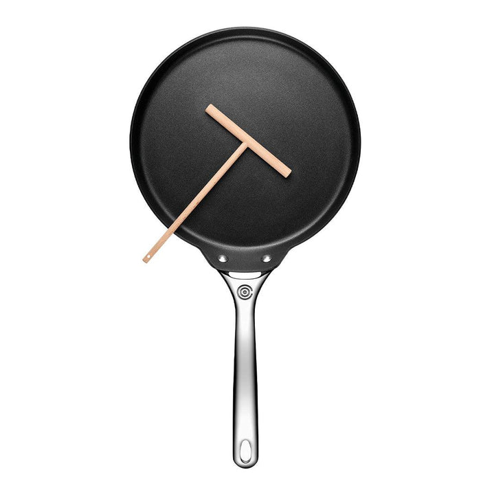 Top view of Le Creuset Toughened Nonstick PRO 11″ Crepe Pan with Rateau displayed vertically on a white background