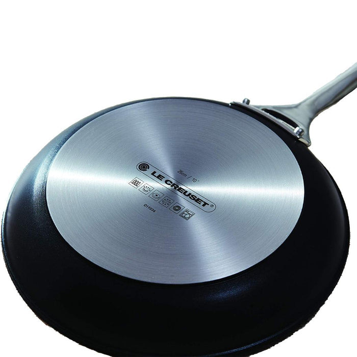 Bottom view of Le Creuset Toughened Nonstick PRO fry pan displayed on a white background