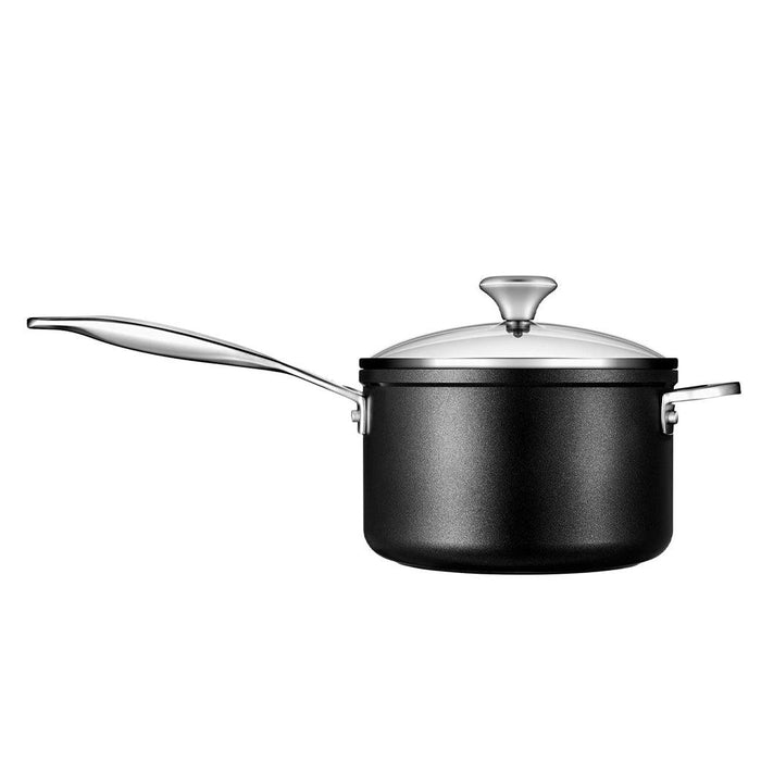 Side view of Le Creuset Toughened Nonstick PRO 3 qt. Saucepan with Glass Lid displayed on a white background
