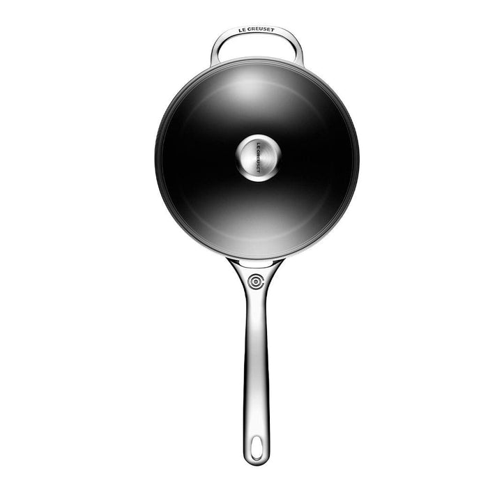 Top view of Le Creuset Toughened Nonstick PRO 4 qt. Saucepan with Glass Lid displayed vertically on a white background