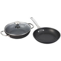 Set of two frying pans with a lid on a white background