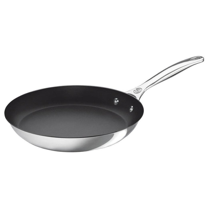 12 inch Le Creuset Tri-Ply Stainless Steel Nonstick Fry Pan displayed on a white background