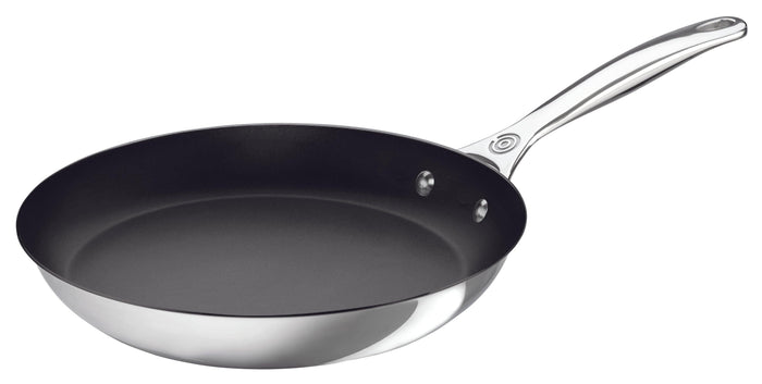 8 inch Le Creuset Tri-Ply Stainless Steel Nonstick Fry Pan displayed on a white background