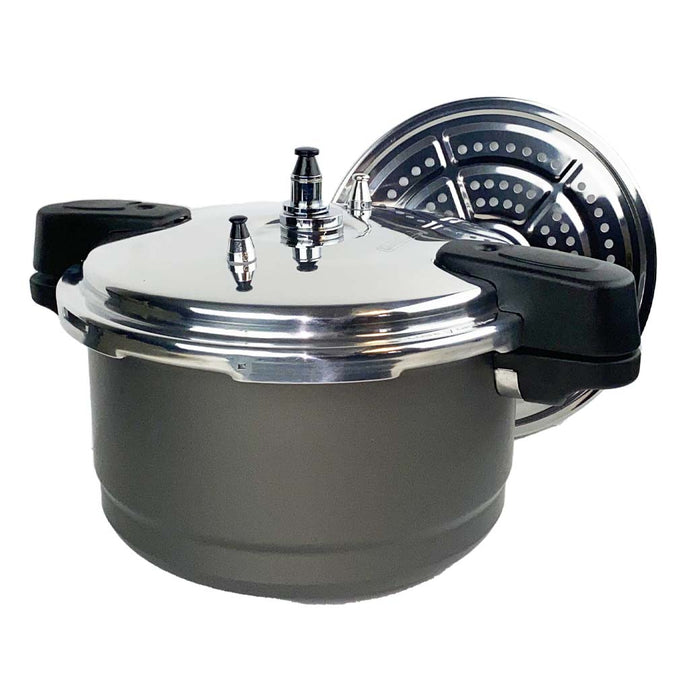 Pressure cooker with a charcoal body and silver lid on a white background