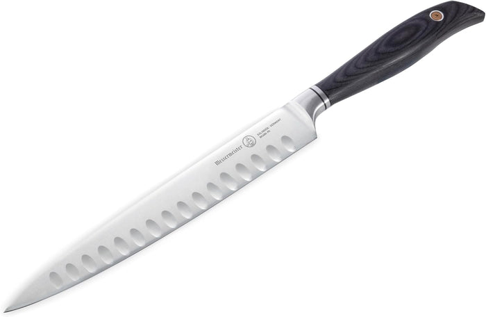 Knife with a black handle on a white background