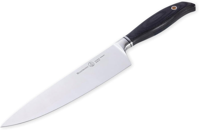 Chef's knife with a black handle on a white background