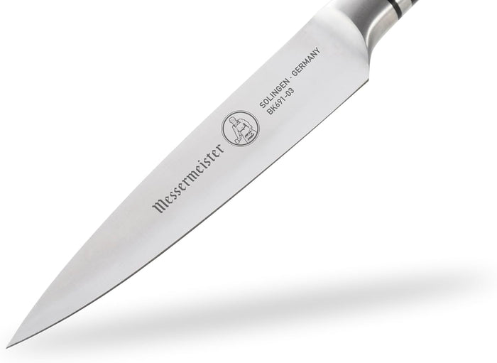 Knife blade with 'Messermeister' branding on a white background