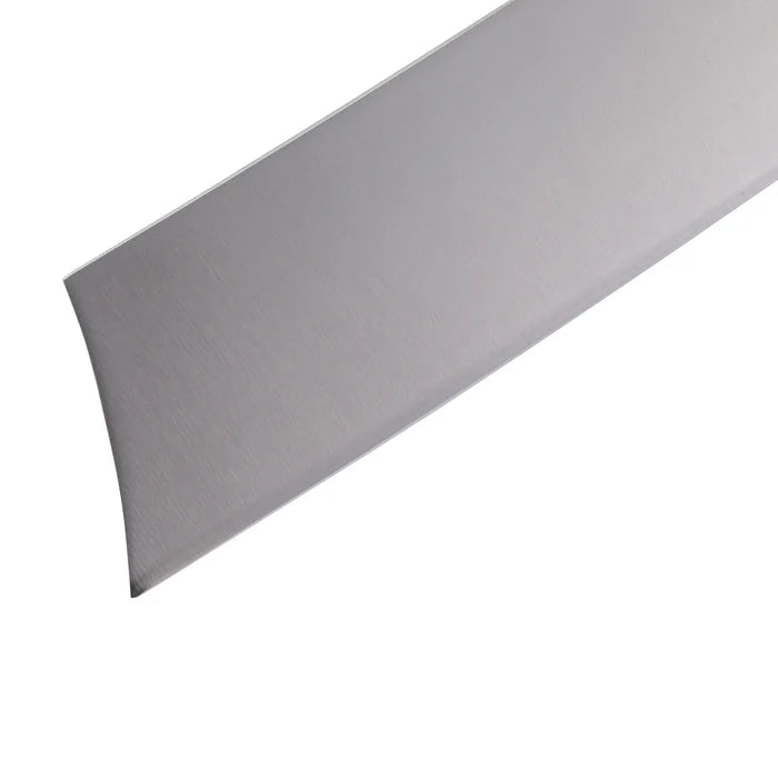 Close up of a knife's blade displayed on a white background