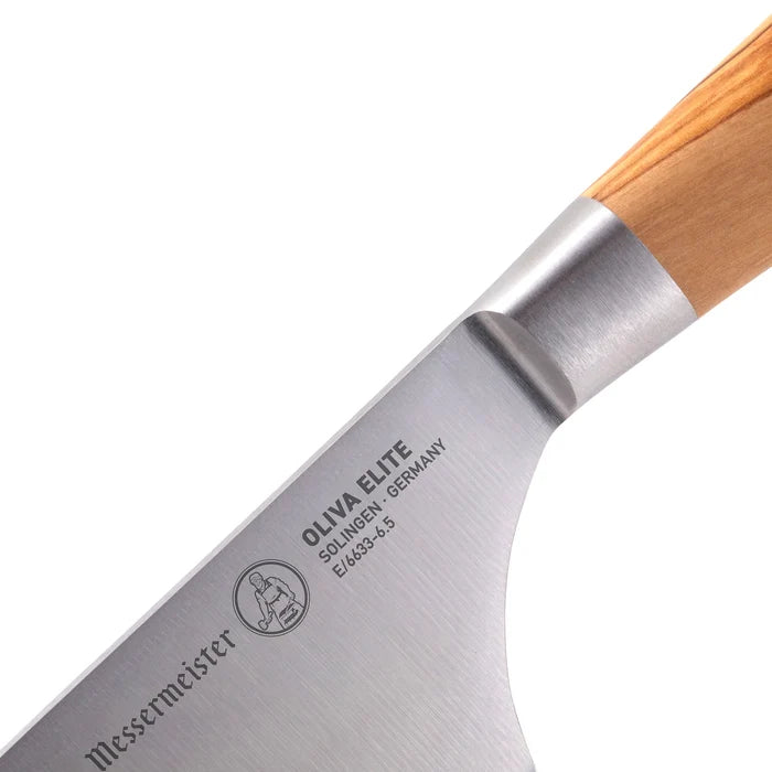 Close up of a knife's hilt displayed on a white background