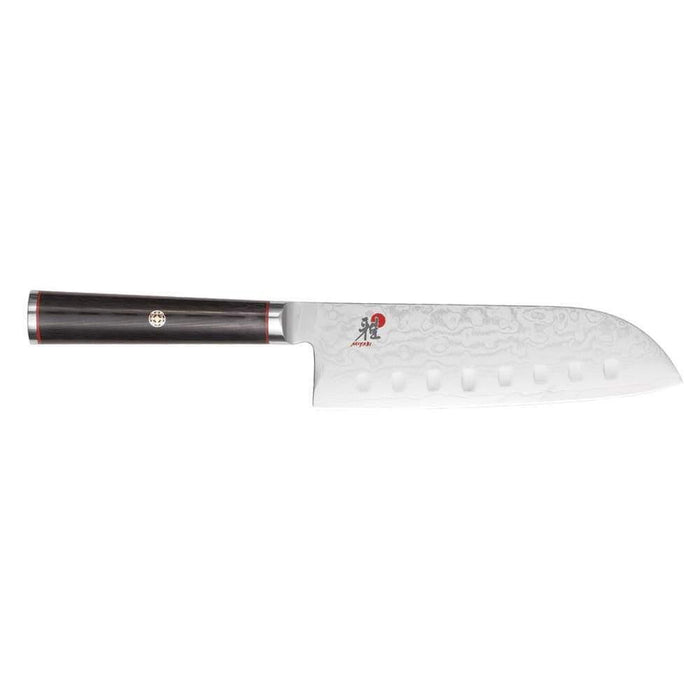 5.5 inch Miyabi Kaizen Hollow Edge Santoku Knife displayed horizontally on a white background