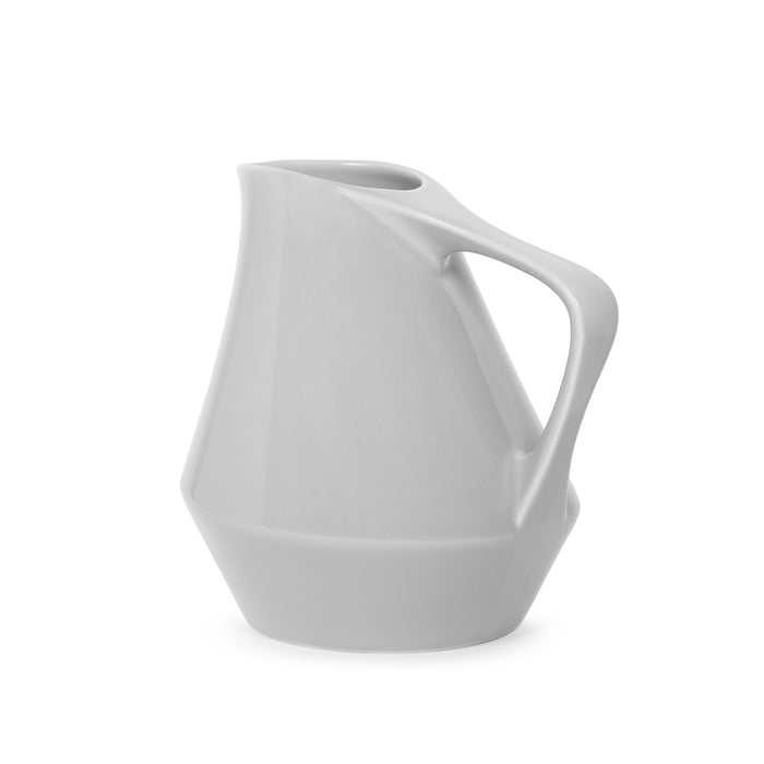 Gray ceramic pitcher on a white background