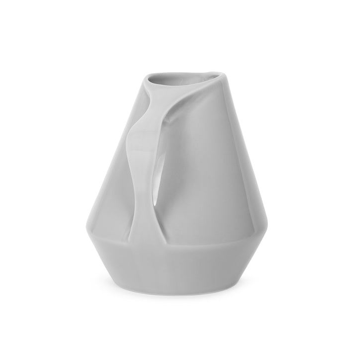 Side view of gray ceramic pitcher on a white background