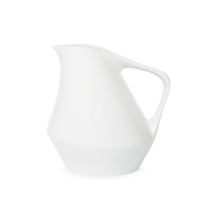 Front view of white ceramic pitcher on a white background