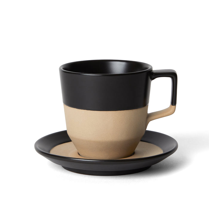Large 12 oz black notneutral pico cup and saucer on a white background