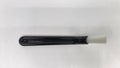 Black brush with white bristle head on a white background
