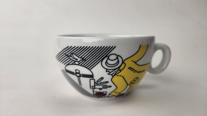 Ceramic cup with artistic design on a white background
