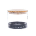 Medium airscape glass container with airtight lid and bamboo lid on a white background