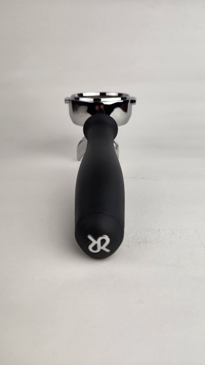 Rancillio portafilter with handle and double spout on a light background