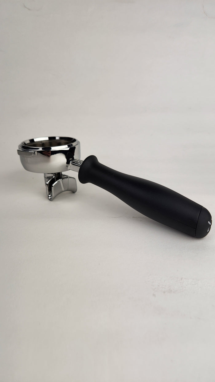 Double spout portafilter with black handle on a white background