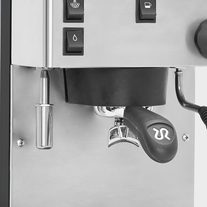 Close up of black Rancilio Silvia portafilter attached to espresso machine