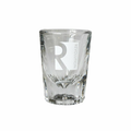 Clear glass shot glass with 'R' and 'Revolution' text on a white background