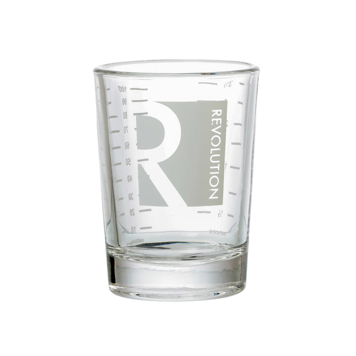 Clear glass tumbler with 'Revolution' branding on a white background