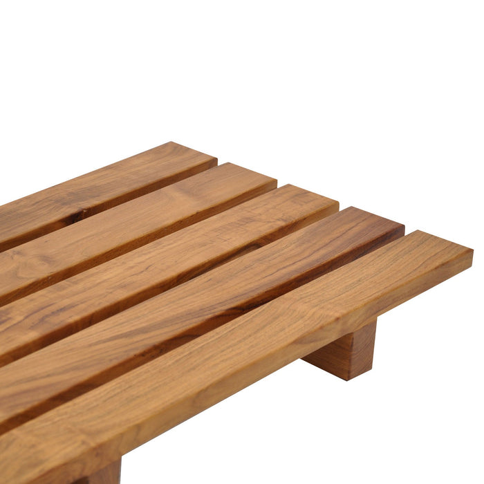 Close up of corner of teak tub caddy with horizontal planks displayed on a a white background