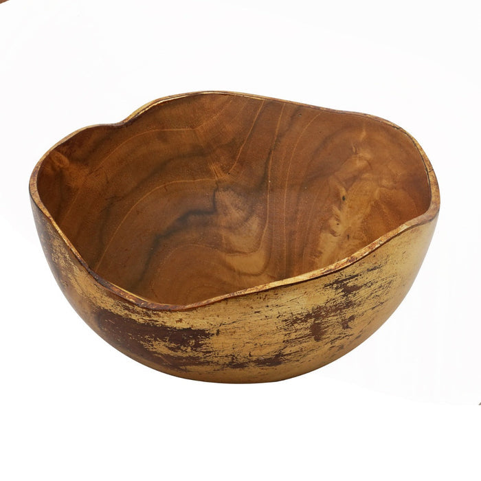 Extra large teak bowl with distressed gold leaf exterior displayed on a white background