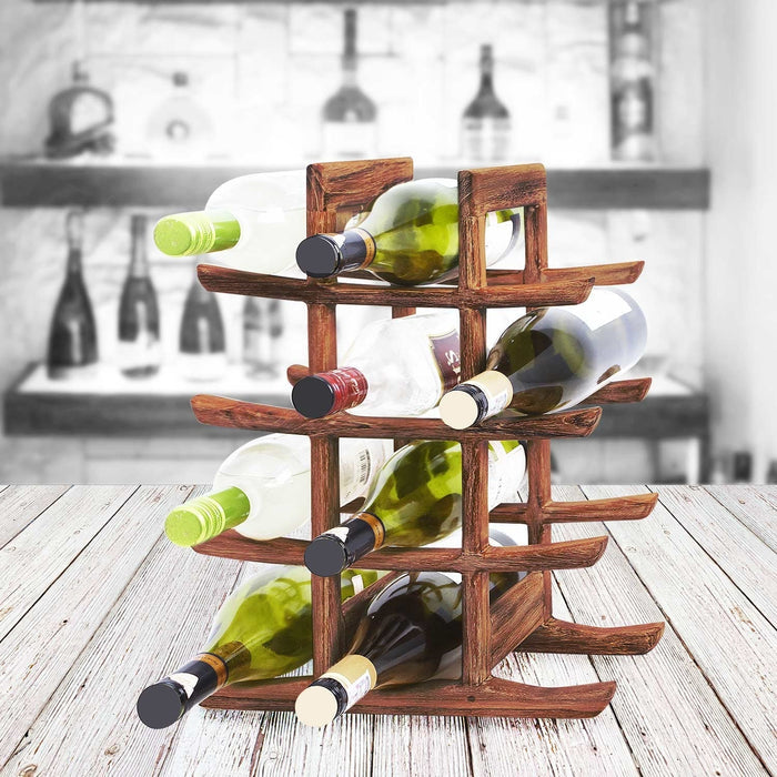 A brown teak wooden wine rack with a horizontal design, displaying multiple bottles of wine, placed on a wooden surface with blurred kitchen setting in the background.