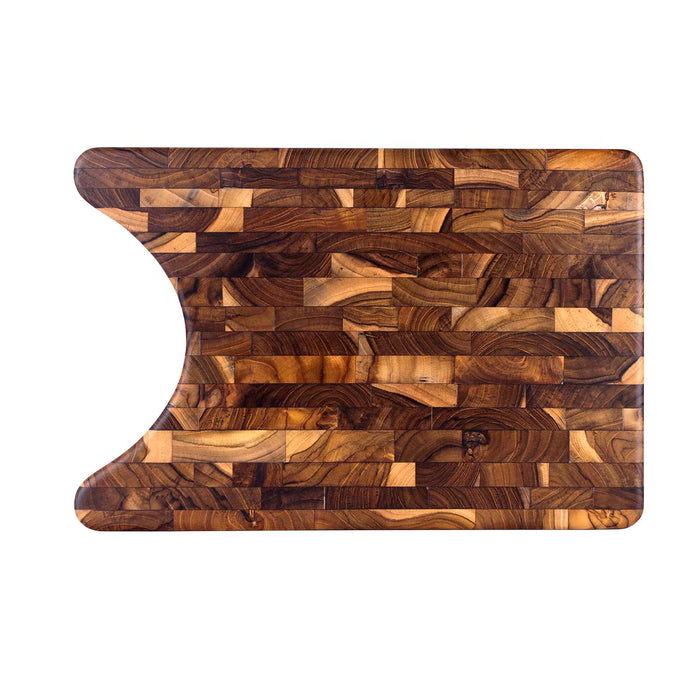 Top view of end grain teak cutting board with cut out for plate displayed horizontally on a white background