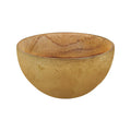 Teak bowl with gold leaf exterior displayed on a white background