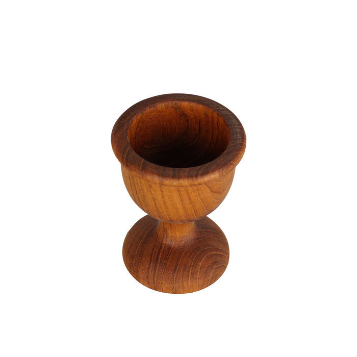 Top view of teak egg cup displayed on white background