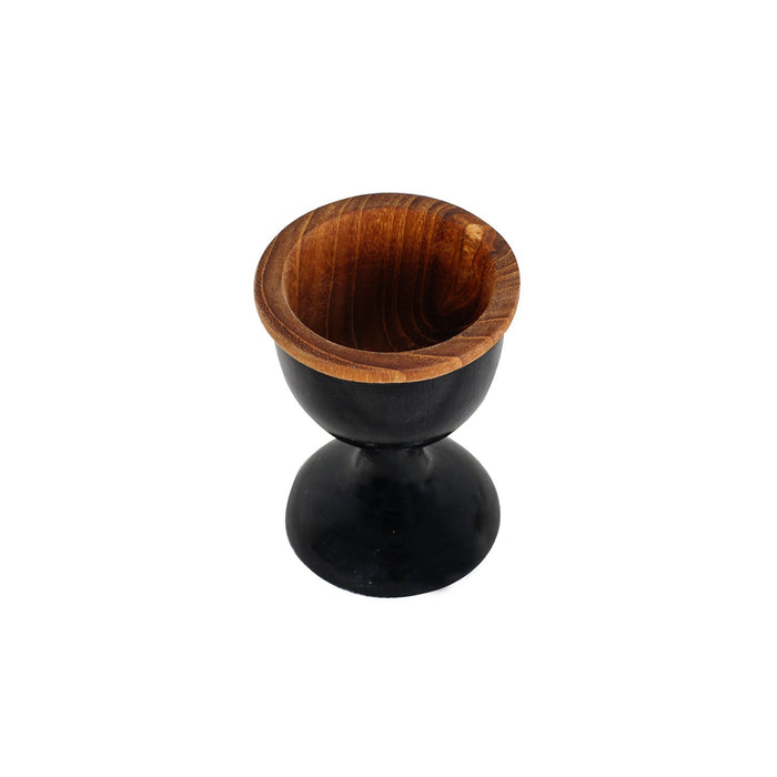 Top view of teak egg cup with black exterior displayed on a white background