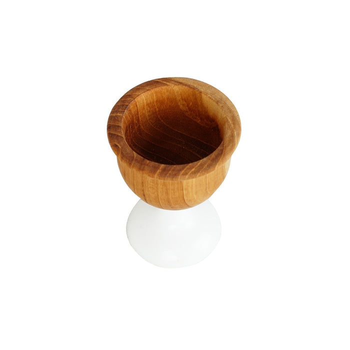 Top view of teak egg cups with white foot displayed on a white background