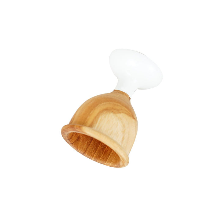 Teak egg cups with white foot displayed upside, diagonally on a white background