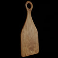 Rico & Plato epazote teak cutting board serving platter displayed vertically on a black background