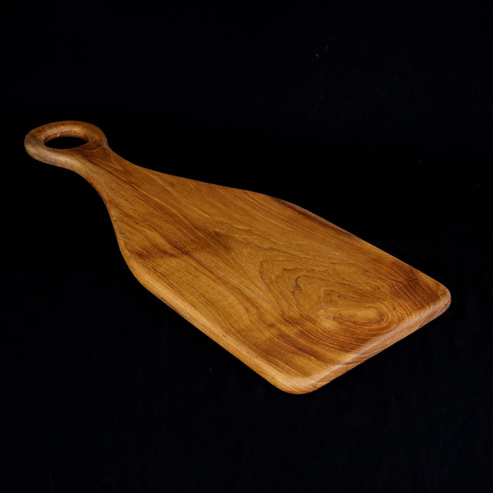 Rico & Plato epazote teak cutting board serving platter displayed on a black background