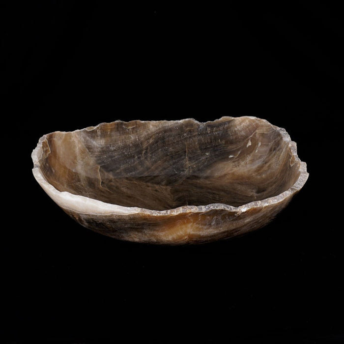 Side view of onyx bowl displayed on a black background