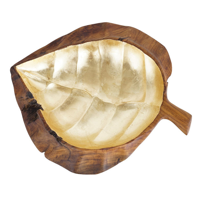 Top view of teak fruit bowl shaped as a leaf with gold leaf interior displayed on a white background
