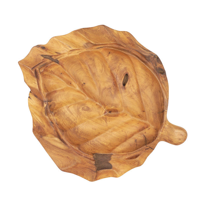 Top view of teak fruit bowl shaped as a leaf displayed on a white background