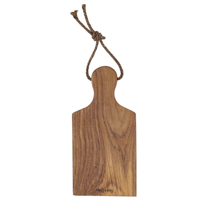 Rico & Plato ginger teak cutting board serving platter with a rope handle displayed vertically on a white background