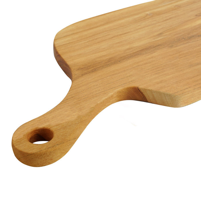 Close up of natural teak handle of teak cutting board displayed on a white background