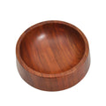 Top view of mahogany, large dog bowl displayed on a white background