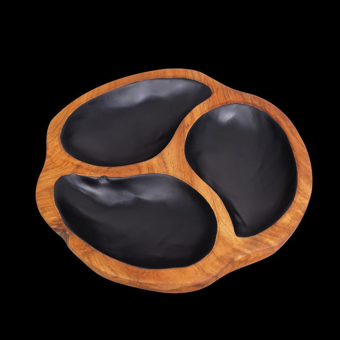 Teak bowl with 3 sections of black interior displayed on a black background