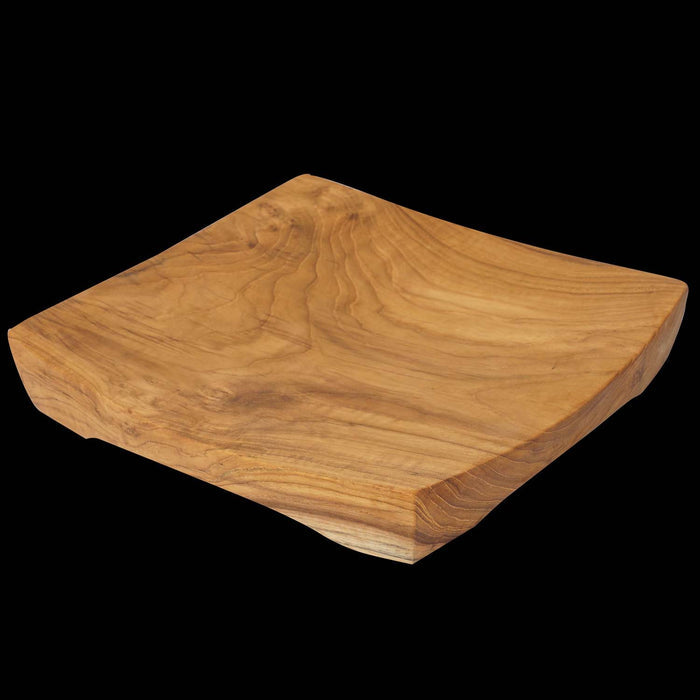 Rico & Plato mick teak serving tray displayed on a black background