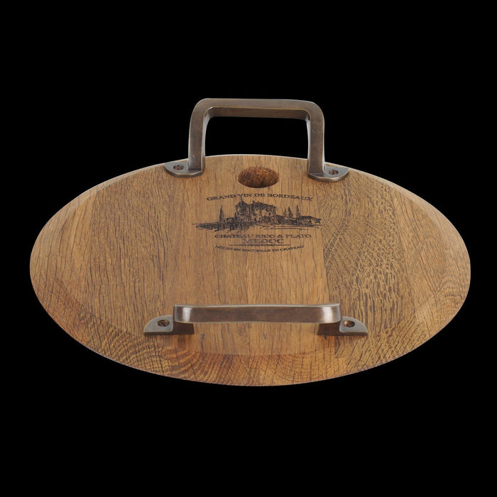 Side view of small oak serving platter with metal handles displayed on a black background