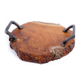 Teak serving platter with metal handles with decorations carved on the side of the serving platter displayed on a white background