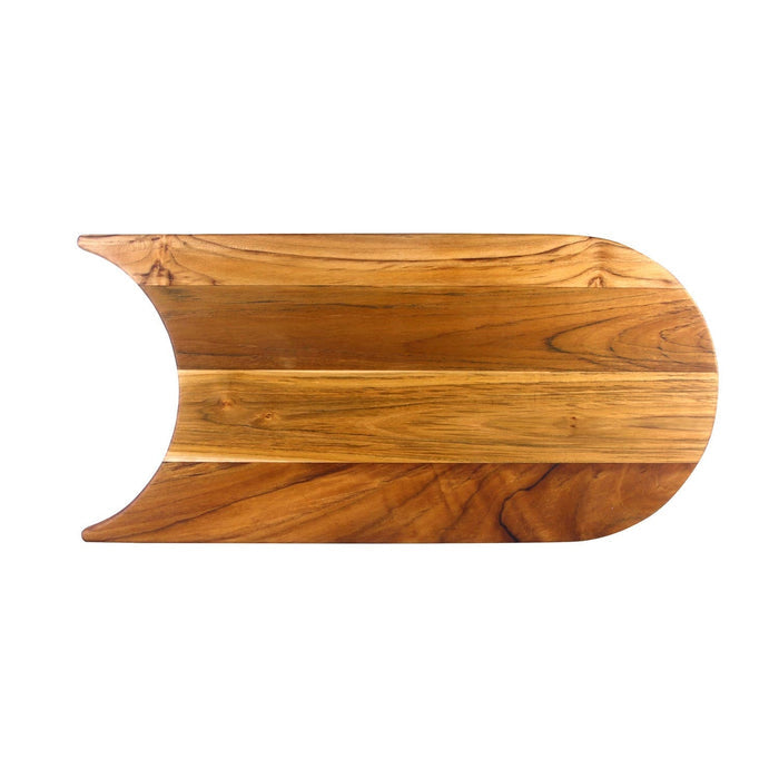 Top view of teak cutting board with a plate cut out displayed on a white background
